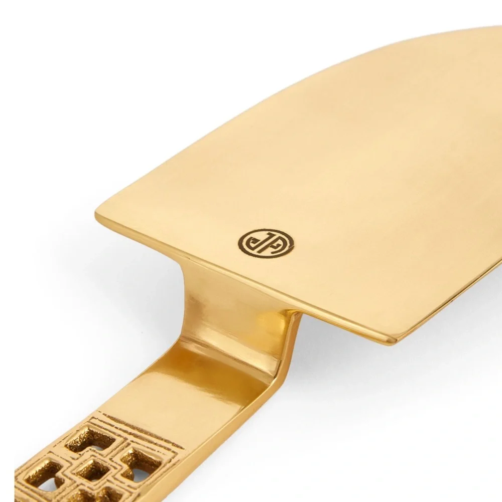 Jonathan Adler Nixon brass cake knife